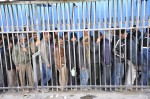 Many Palestinians are separated from their jobs, schools, hospitals, and agricultural lands by the Hafrada/Separation Barrier which cuts deep into Palestinian land.  To go from one encircled Palestinian ghetto to another, they often wait for hours at checkpoints like this one in Bethlehem.